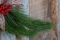 Authentic and rustic Christmas holiday decorations on weathered wood Royalty Free Stock Photo