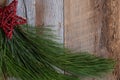 Authentic and rustic Christmas holiday decorations on weathered wood