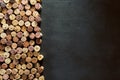 Authentic, rustic corks and black copy space Royalty Free Stock Photo