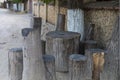 Authentic rustic table and chairs made from tree stumps. Travel Royalty Free Stock Photo