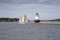 Authentic Schooner Sailboat Sails Past Maine Lighthouse Royalty Free Stock Photo