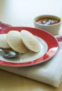 Hot, steamed Idlis served with sambar. Royalty Free Stock Photo