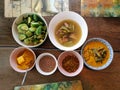 Authentic Thai food on wood table. Food from above concept.