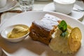 Authentic traditional apple strudel, Apfelstrudel in Vienna, Austria. Served on a white plate Royalty Free Stock Photo