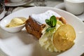 Authentic traditional apple strudel, Apfelstrudel in Vienna, Austria. Served on a white plate Royalty Free Stock Photo