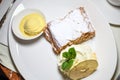 Authentic traditional apple strudel, Apfelstrudel in Vienna, Austria. Served on a white plate Royalty Free Stock Photo