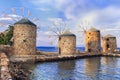 Traditional old windmills over sunset,Chios island,Greece. Royalty Free Stock Photo