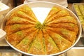 authentic turkish arabic dessert baklava or kunafa for sell in a glass display