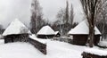 Authentic ukrainian village with wooden huts and fences