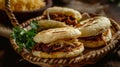 Authentic Venezuelan arepas, cornmeal cakes filled with cheese, pulled pork, or beans, beautifully presented in a rustic Royalty Free Stock Photo