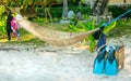 Authentic view of snorkeling equipment drying near a traditional