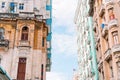 Authentic view of a street of Old Havana with old buildings and cars Royalty Free Stock Photo