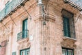 Authentic view of a street of Old Havana with old buildings and cars