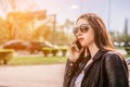 Attractive spontaneous woman talking on the phone.