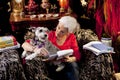 Author Heloise In Her Living Room With Her Dog Cabbie