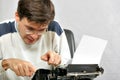 Author typing his bestseller Royalty Free Stock Photo