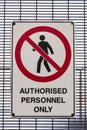An authorised personnel only sign on a metal gate