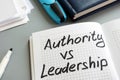Authority vs Leadership sign in the note. Types of management Royalty Free Stock Photo