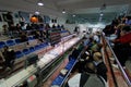 Authorized buyers bidding for captures on a fish market