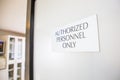 Authorized Personnel Only sign at oral surgery dental medical office practice sterilization room staff equipment and