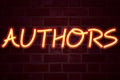 Authors neon sign on brick wall background. Fluorescent Neon tube Sign on brickwork Business concept for Word Message Text Typogra