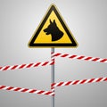 Aution - danger Be aware of dogs The area is guarded by dogs. Warning sign safety. The sign on the pole and warning bands. Gray ba