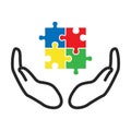 Autism Colorful Jigsaw puzzle with open hands on the white background. Isolated illustration