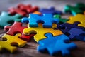 Autism symbol, colorful puzzle pieces, representation of neurodiversity