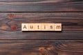 autism word written on wood block. autism text on table, concept Royalty Free Stock Photo