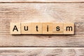 Autism word written on wood block. autism text on table, concept Royalty Free Stock Photo