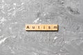 Autism word written on wood block. autism text on table, concept Royalty Free Stock Photo