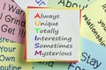 Autism written on note acronym concept Royalty Free Stock Photo