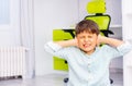 Autistic boy in pain close ears to stop the noise Royalty Free Stock Photo