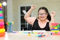 Autistic girl practicing learning development at home