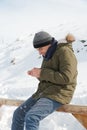 Autistic teenage boy exploring snow Royalty Free Stock Photo