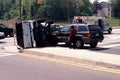 Auto Accident with ine car overturned