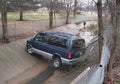 Auto accident where a van is in a drainage ditch in New Carrolton, Maryland