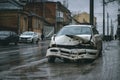 Auto accident on the street. A car damaged after a severe accident stands on a city street.