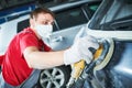 Auto repairman grinding autobody Royalty Free Stock Photo