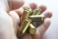 45 Auto Bullets In Hand Close Up High Quality Royalty Free Stock Photo