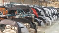 Auto bumpers parts are installed on the racks after painting in the car factory. Industry concept
