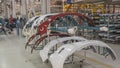 Auto bumpers parts are installed on the racks after painting in the car factory. Industry concept