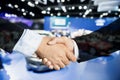 Auto business, car sale, deal, gesture and people concept - Close up of male handshake in auto show or salon.