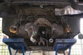 the auto car in srvice to fix and repair some problems, bottom of the vehicle Royalty Free Stock Photo