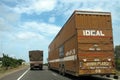 Auto carrier trucks on highway