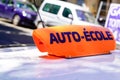 Auto ecole text in french means driving school sign write on education learning car roof Royalty Free Stock Photo