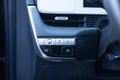 Auto hold button in a modern vehicle. ESP electronic stability program control. Interior detail of a modern electric car