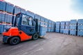 Auto loader with concrete blocks near house-building factory Royalty Free Stock Photo