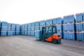 Auto loader with concrete blocks near house-building factory Royalty Free Stock Photo