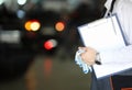 Auto mechanic and auto engineer technician holding clipboard blank sheet with copy space for car repair checklist Royalty Free Stock Photo